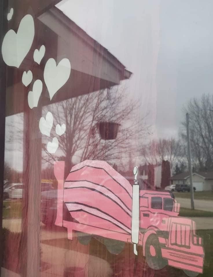 Ozinga's tweet image. Kris Kiley is an Ozinga driver in our Illinois North region. His family wanted to take part in the Heart Hunters Facebook campaign and wanted to do it with an Ozinga ready mix truck. Pictured is his son Kellen.