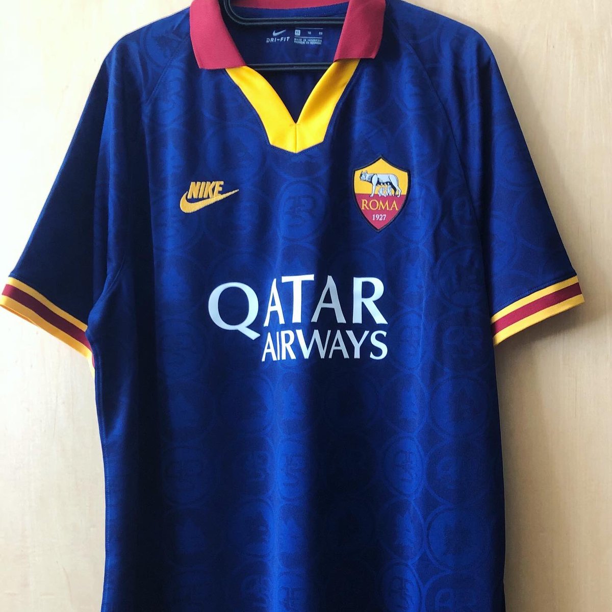 . @ASRomaENThird Kit, 2019/20NikePiero Gratton passed away yesterday. He was the author of the “Lupetto”, Roma’s historic logo. Despite it not having been used for a while now, Nike included the “Lupetto” in the 90s-inspired pattern of Roma’s 3rd kit this year. #Homeshirt