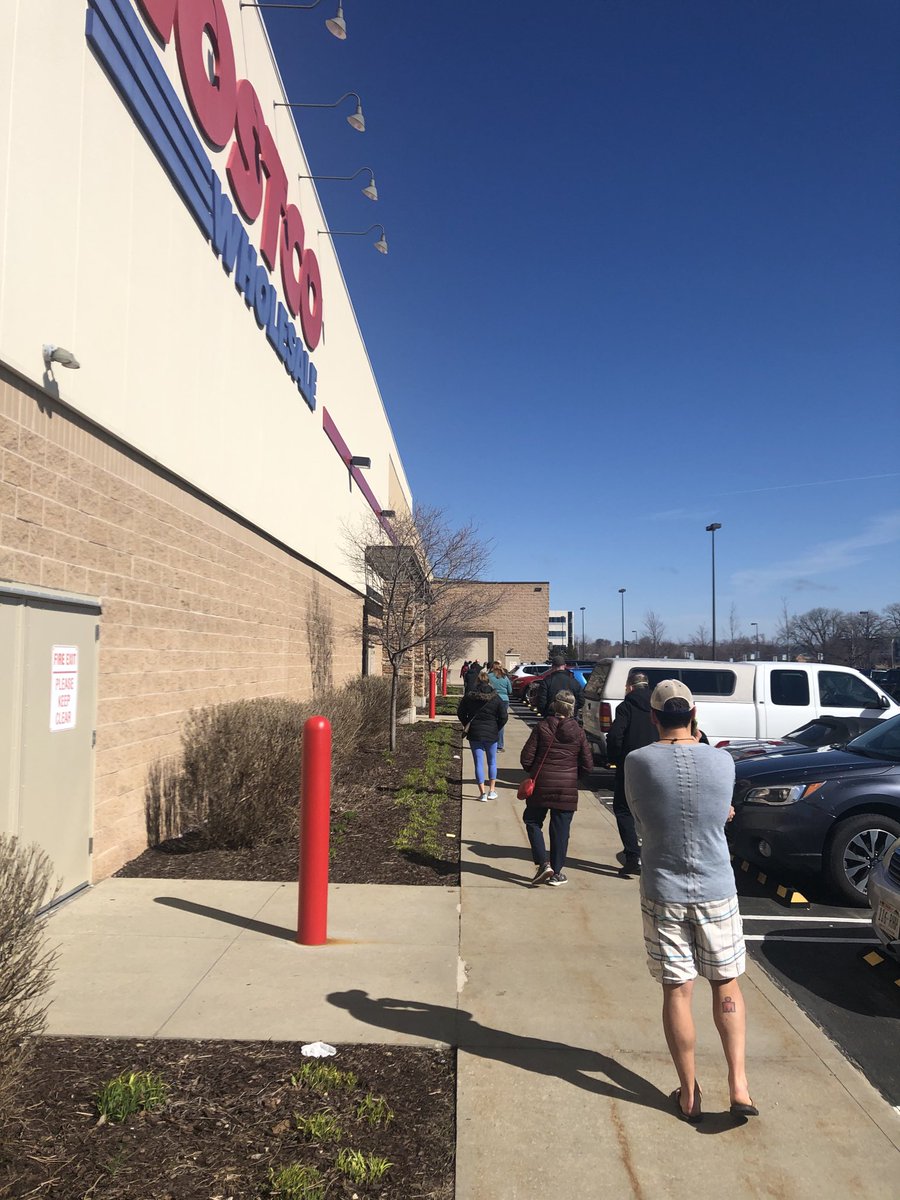 RandeepDang's tweet photo. Love the Madison people - long line at Costco - everyone respectfully waiting 6 feet apart... #madison #coronavirus https://t.co/u48WFHpJTQ
