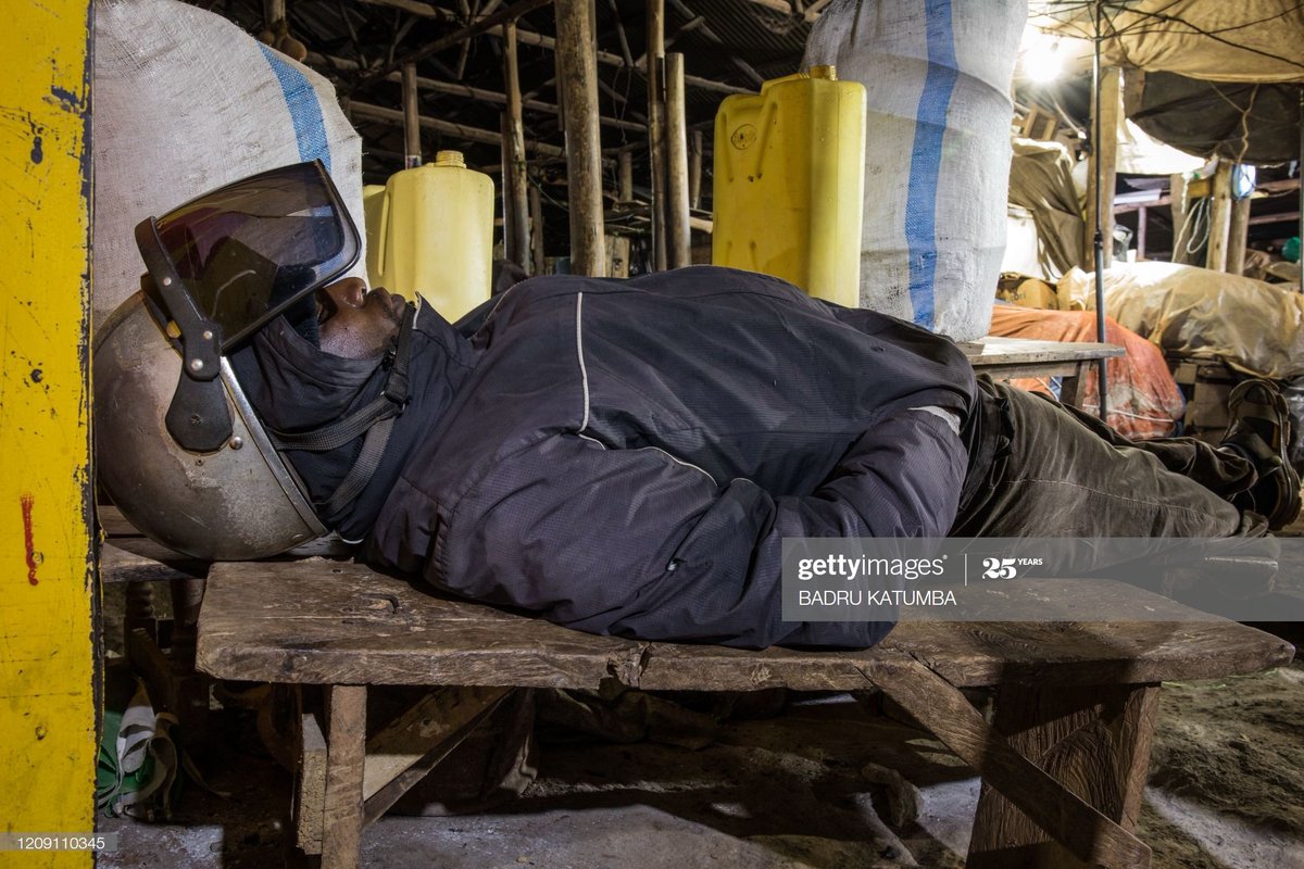 A mobile money trader sleeps on a bench inside a market following a directive from president Museveni that all vendors should sleep in markets for 14 days to avoid contact with their families to curb the COVID-19 coronavirus in Uganda.  #COVID19  #COVID19UG  #StaySafeStayHome