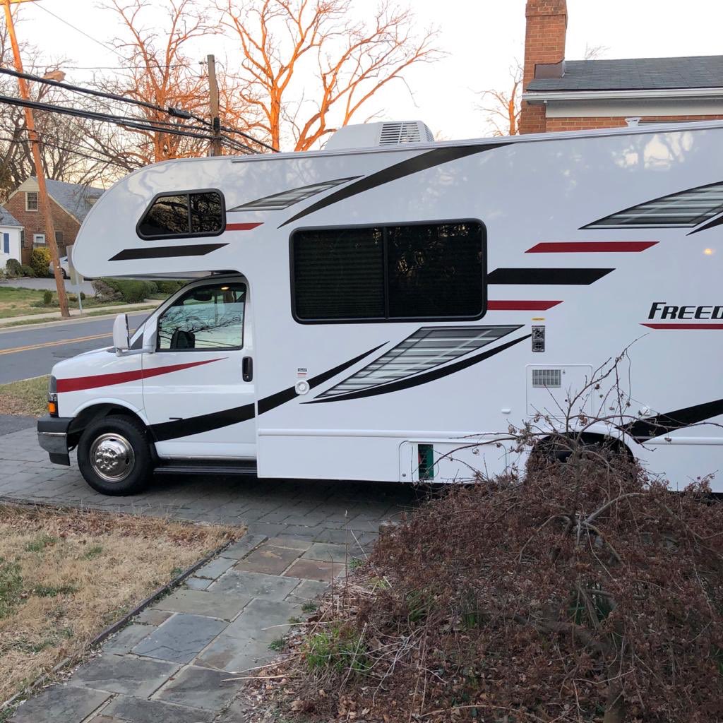 Let’s start with the outside. It came with all these lame decals. I hate them. (Rv shown here in Maryland when GR dad picked it up)