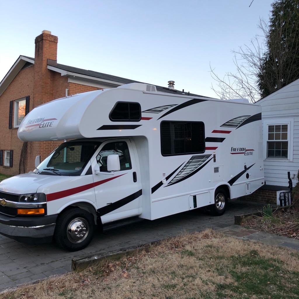 Let’s start with the outside. It came with all these lame decals. I hate them. (Rv shown here in Maryland when GR dad picked it up)