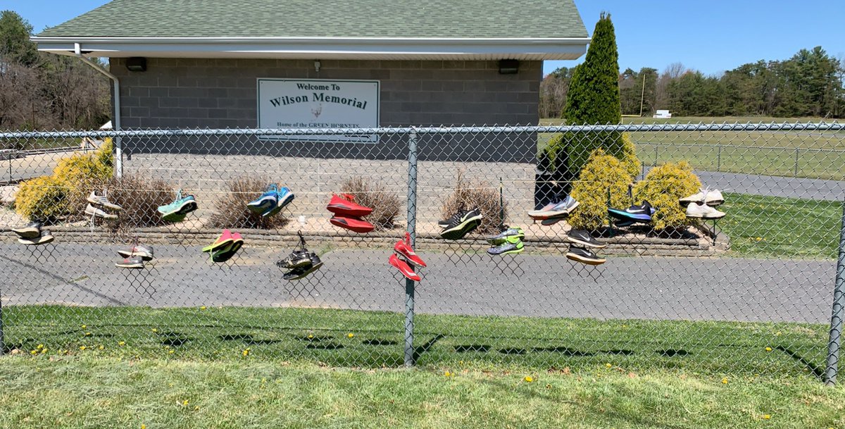 RittsKylie's tweet image. if you get a chance today stop by the WMHS track to hang your old shoes or stop by the flag pole at the entrance of the complex for a memorial for Coach Kess💛💚 #runwilsonstrong #fillthefence