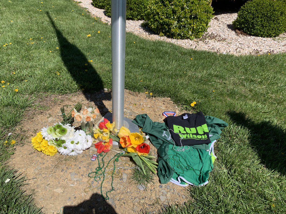 RittsKylie's tweet image. if you get a chance today stop by the WMHS track to hang your old shoes or stop by the flag pole at the entrance of the complex for a memorial for Coach Kess💛💚 #runwilsonstrong #fillthefence