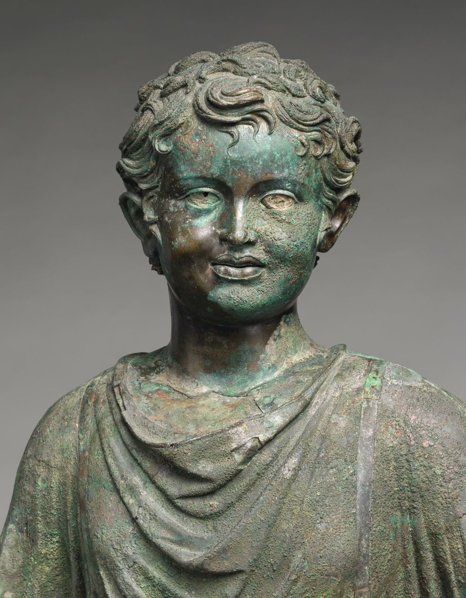 Bronze statue of a camillus, a young attendant (acolyte) at Roman cult sacrifices. He likely held ritual objects like a container for incense in his left hand and a jug for wine. Early Imperial, Julio-Claudian ca. A.D. 14–54 at Met.