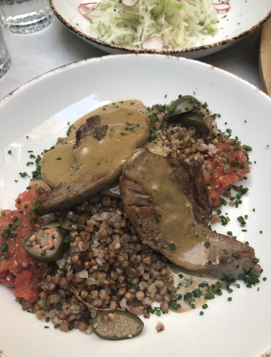 Beef tongue with bulgur at traditional Russian restaurant Zima