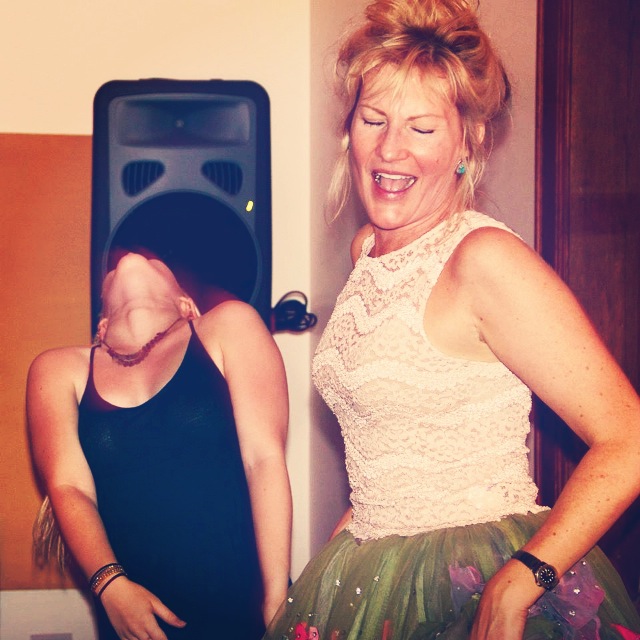 That's it! These take no time at all, are breathable and pretty much as safe as you can get using household materials. Here's a picture of my hot mom dancing during pre-quarantine times, to close things out. Please share!