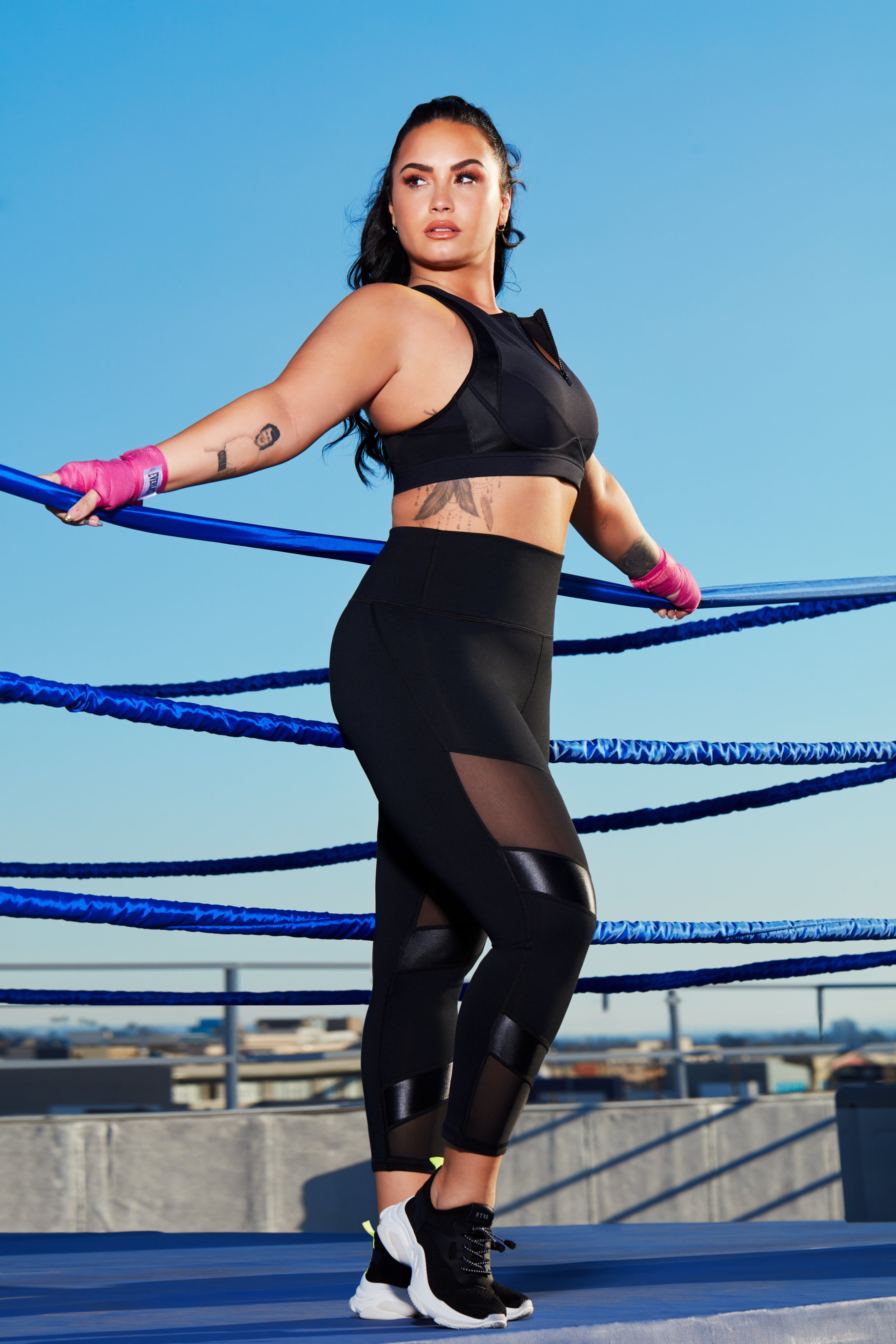 Demi Lovato Shoots Fabletics Commercial in Purple Workout Gear and