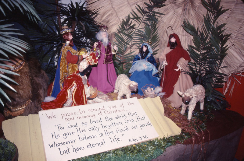 OK, a nativity scene. Seems normal! Not totally loving those possessed-looking lambs but the rinky-dink calligraphy and homemade doll outfits aren't without their own sort of home-grown charm