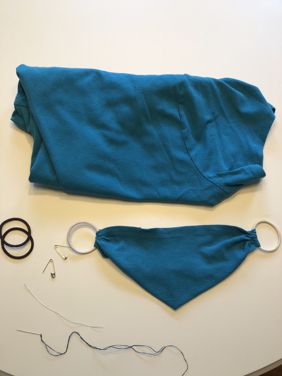 CDC now recommends using a face covering if you must leave your home. Here how to do it minimal sewing skills! What you need:Least favorite short sleeved shirt2 Hair bands or rubber bandsTwisty tie(from bread)Needle and thread #Masks4All  #StayHome  #DemCast