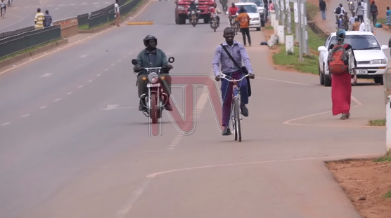 ntvuganda's tweet photo. Over the last few weeks, 28-year-old Ssentongo has been cycling nearly 22 Kilometres to Mildmay Hospital in Lweza to pick anti-retroviral drugs for people living with HIV in his community #NTVNews https://t.co/hPb8JliaKY https://t.co/62FWhIG2pH