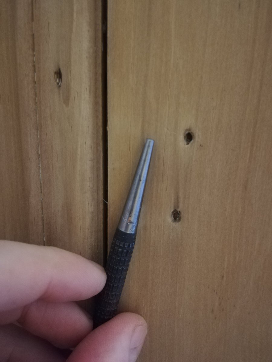 Job number 1 - bang in any remaining pins with a nail punch. Trying to pull "lost head" nails out causes much more mess than just pushing them in and filling over