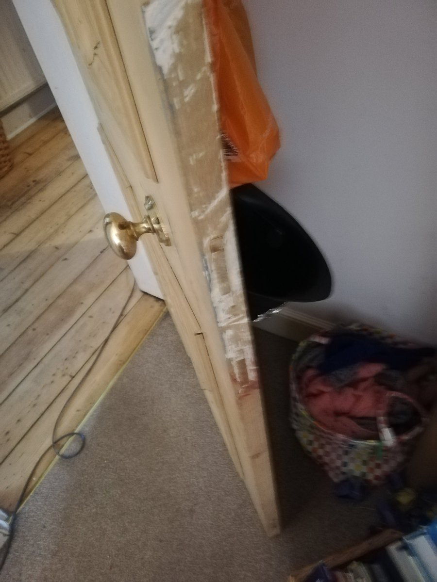 Job number 3. I'm not sure how, but many years ago, someone made a complete arse-up of slimming this door down to fit. I'm not sure what sort of badly-wielded, blunt tool managed to cause this butchery, but it's going to need planed flat.