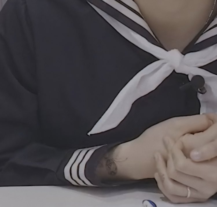 The fish tattoo?