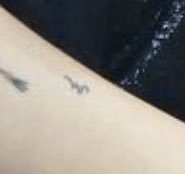This tattoo which I’m not really sure about?kinda looks like a music note
