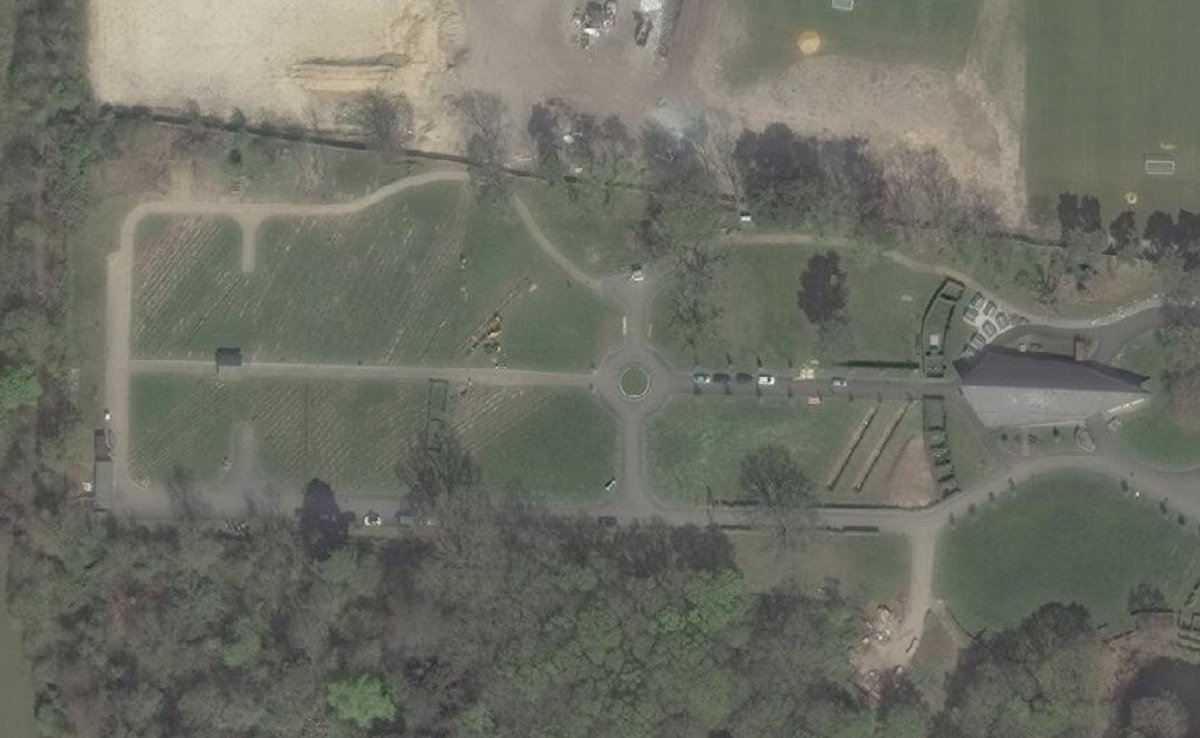 Here, in a cemetery on the SE outskirts of London (Chislehurst) are two mass-graves measuring 25m long each.  https://www.google.com/maps/place/51%C2%B025'40.3%22N+0%C2%B004'55.1%22E/@51.427855,0.0813519,198m/data=!3m2!1e3!4b1!4m13!1m6!3m5!1s0x47d8abfd0456cc95:0x36d5121bdde21e95!2sGreenAcres+Kemnal+Park+Cemetery+and+Ceremonial+Park!8m2!3d51.4277916!4d0.0832749!3m5!1s0x0:0x0!7e2!8m2!3d51.4278553!4d0.0819838This imagery is from April 10th.