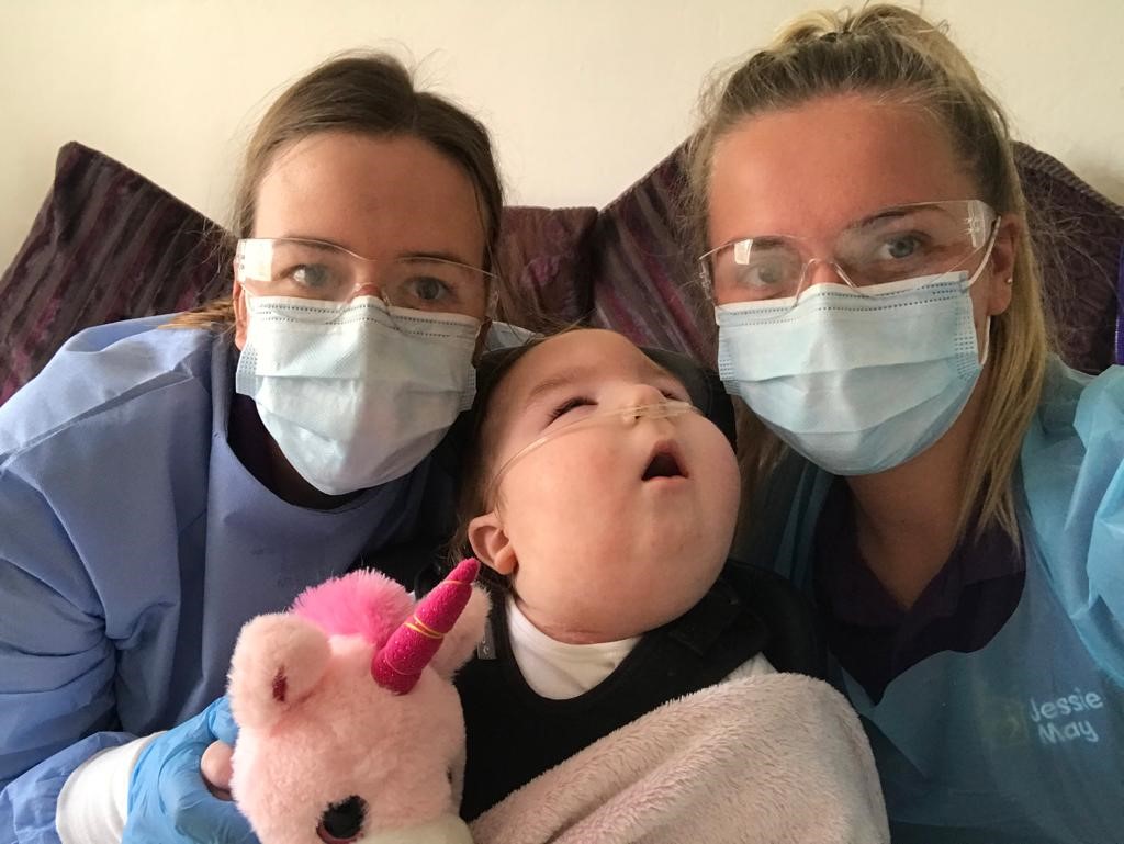 Delivering vital front line care while having a cuddle is all in a day’s work for Jessie May nurses Bryony and Lois. This is the lovely Isla, who enjoyed her cuddles and Disney time yesterday. 💜🦄 #jessiemaynurses #disney #stayhome