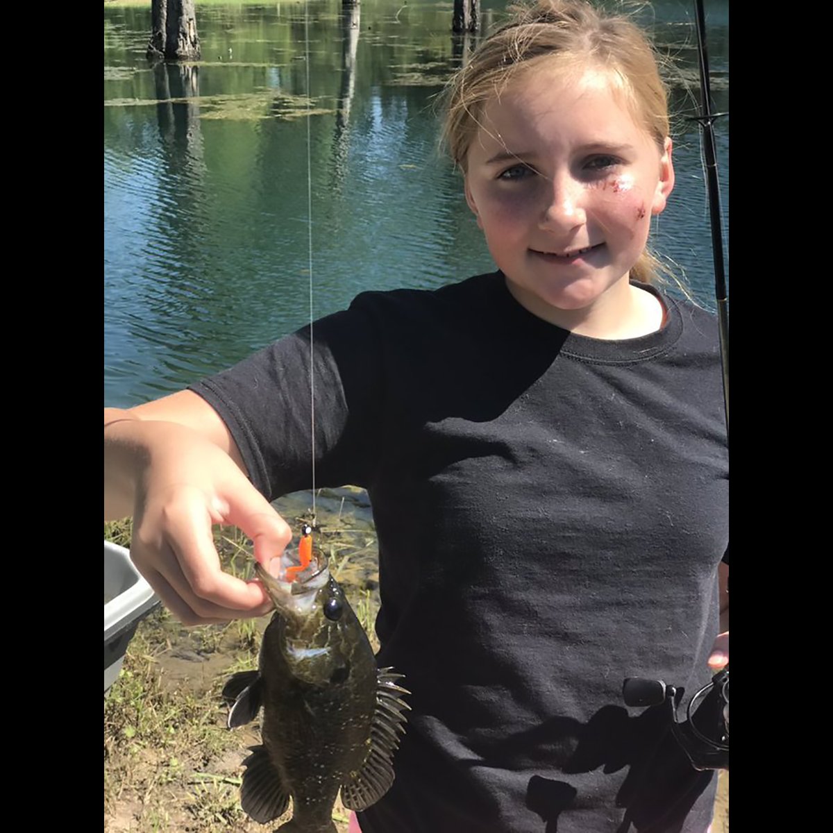 TwisterFishing's tweet photo. Travis Gray took his daughter out for some father-daughter fishing. Check out Claudia getting the job done using a 1" Lil' Bit  Curly Tail! Way to go Claudia, enjoy as much time fishing with your dad as you can, and parents let's all try to take a kid fishing! #TwisterFishing https://t.co/qhlD2GGysC