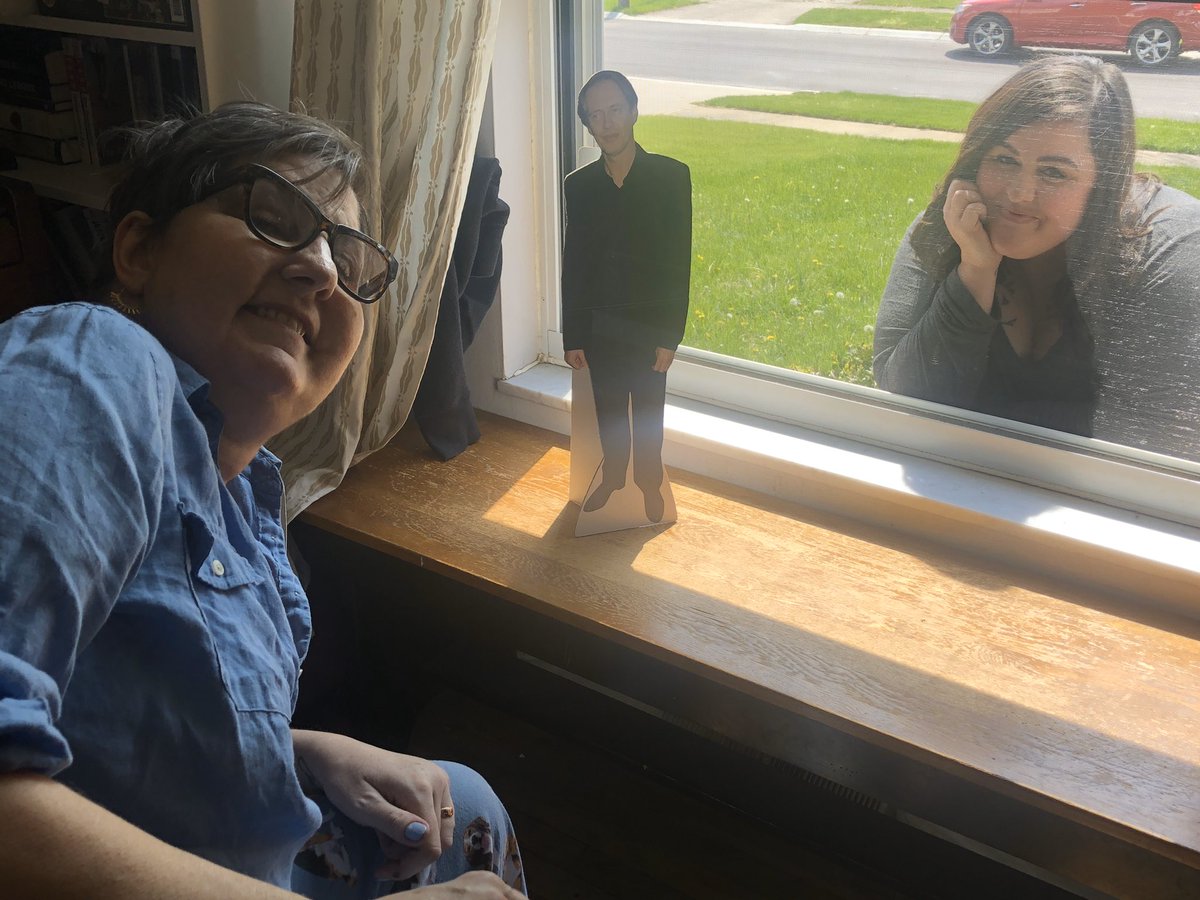 267. Nancy‘s friends have been coming over to visit. Because she is immunocompromised, they stay on the front lawn and the conversation happens through the window.