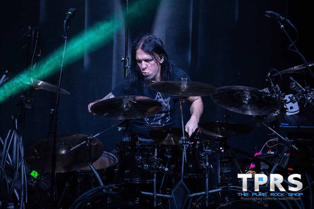 queensryche's tweet photo. Casey Grillo at the Roxian Theatre in Pittsburgh (photo credit Kara Uhrlen for The Pure Rock Shop) #queensryche #theverdicttour2020 #roxiantheatrepgh #caseygrillo #kickassdrummer #talentedmusician #bamfer #lotus #customdrumkit #sawbladheaddesigns #dwdrums #goodtimes #memories https://t.co/b9X8C6qJ7S