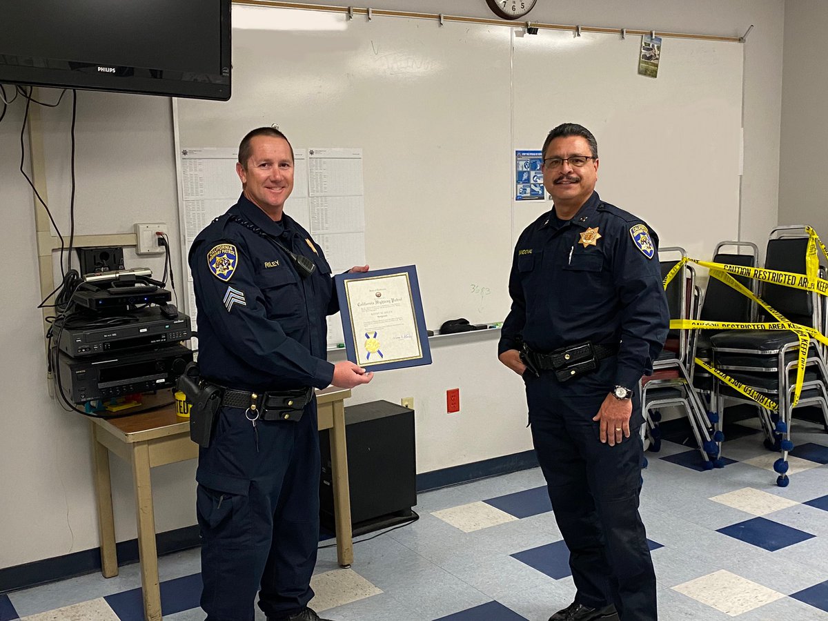 CHPCentralLA's tweet photo. Captain Francisco Sandoval accompanied by Lieutenant Henry Castillo attended graveyard shift briefing to discuss current events and present Sergeant Kevin Riley with his promotional certificate. Congratulations Sergeant Riley on your promotion to Sergeant !!!! https://t.co/BrEtW7I6qJ