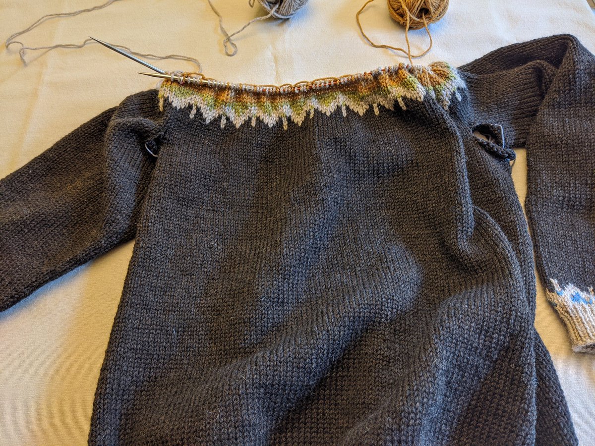 Friday sweater progress. The end is in sight! (Sort of. Not really.) When you put the body and sleeves together, you're suddenly working with a giant, unwieldy pile of sweater in your lap. Each round takes a long time.