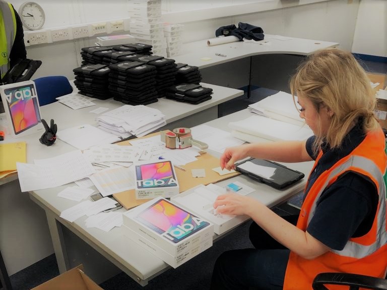 LifeLines_ICU's tweet photo. Ever wondered what a pop-up #COVID19 response virtual-visiting tablet *hotstaging* centre looks like?

Here the heroes 🦸‍♀️🦹of @bt_uk work around the clock to pipeline several thousand tablets from 📦box to bedside🛌 in record time for @LifeLines_ICU 

https://t.co/iYHrXlW63S https://t.co/hix1mXhknW