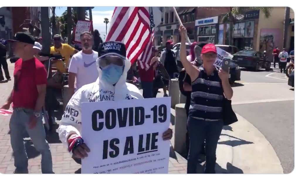 Brian Tyler Cohen on Twitter: "“COVID-19 IS A LIE” reads the sign ...