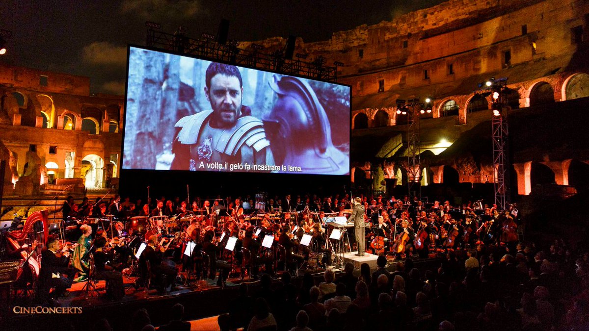 CineConcertsLLC's tweet photo. #HappyFriday! 🎉 
Any plans for a #happyhour #videocall with friends or coworkers? Use these awesome photos taken at our epic #GladiatorLive at the Coliseum in Rome show as your #VirtualBackground 🛡⚔️🏟 
🎶You're Welcome 😉
#StayHomeStaySafe https://t.co/bD17UGnSYU