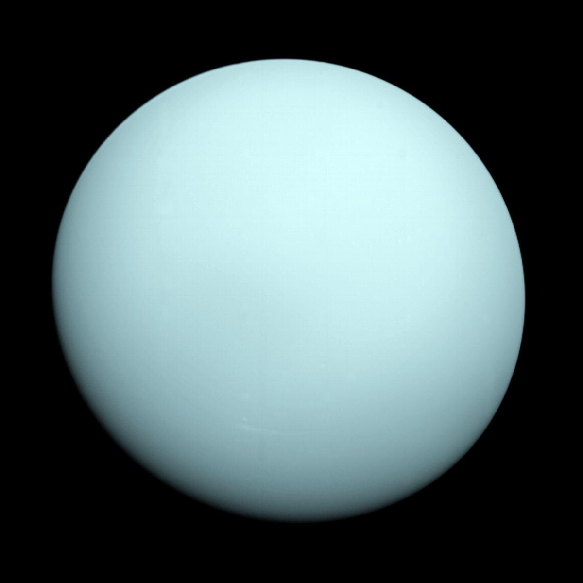 In 1986, Voyager 2 became the first and only spacecraft to fly by the planet Uranus. It took this photo of the ice giant. : NASA/JPL-Caltech