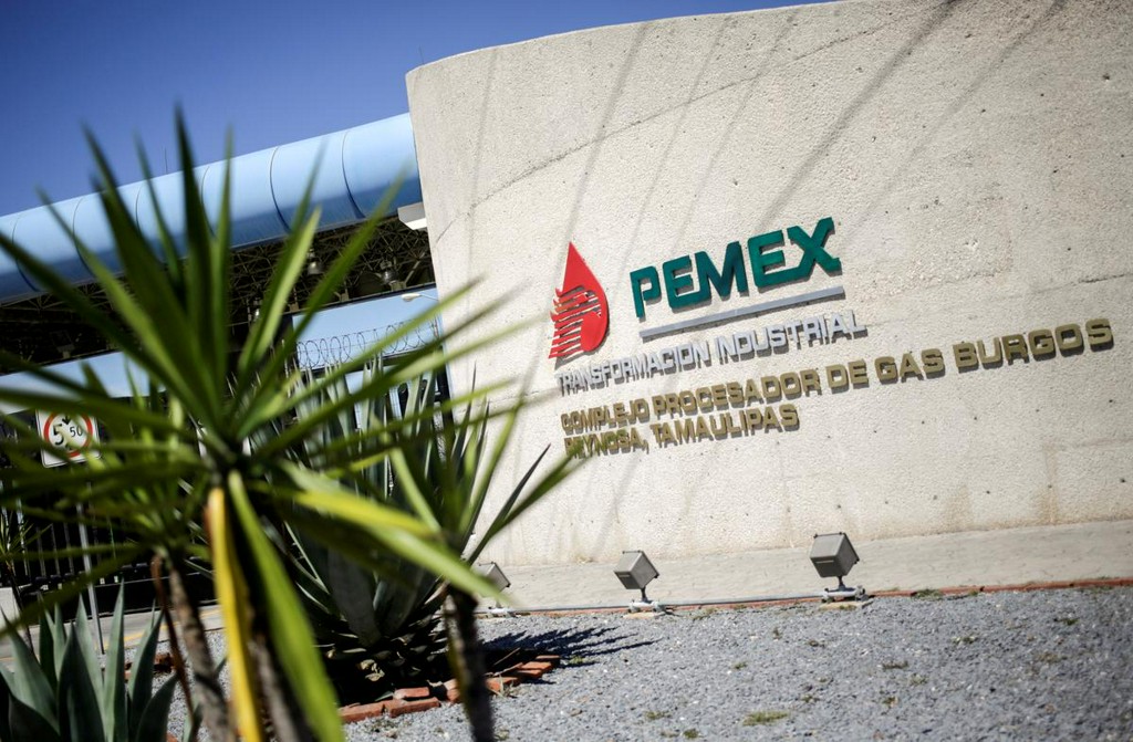Reuters's tweet photo. Pemex debt slashed to junk as Moody's downgrades battered Mexico oil company https://t.co/CsW1UMRTsW https://t.co/wUfHyu4V6M