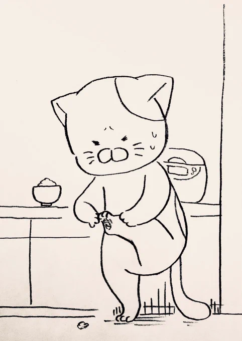 ご飯粒落とした上に踏んじゃったネコ 