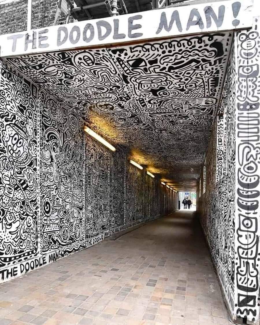 wowlife's tweet photo. #doodleman lights up any dark alley .... #art #Banksy life is just #blackandwhite https://t.co/1RWpfZuPzs
