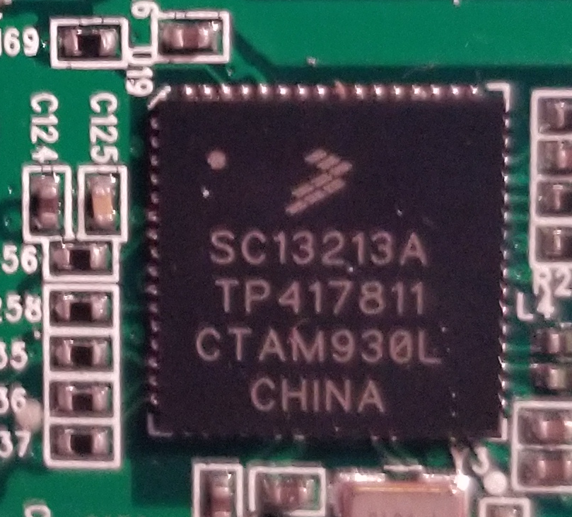 More freescale. It's an SC13213A, which is a transceiver for the 2.4ghz Zigbee protocol.This thing can hook up to external RF blasters, so presumably this is what it uses for that.