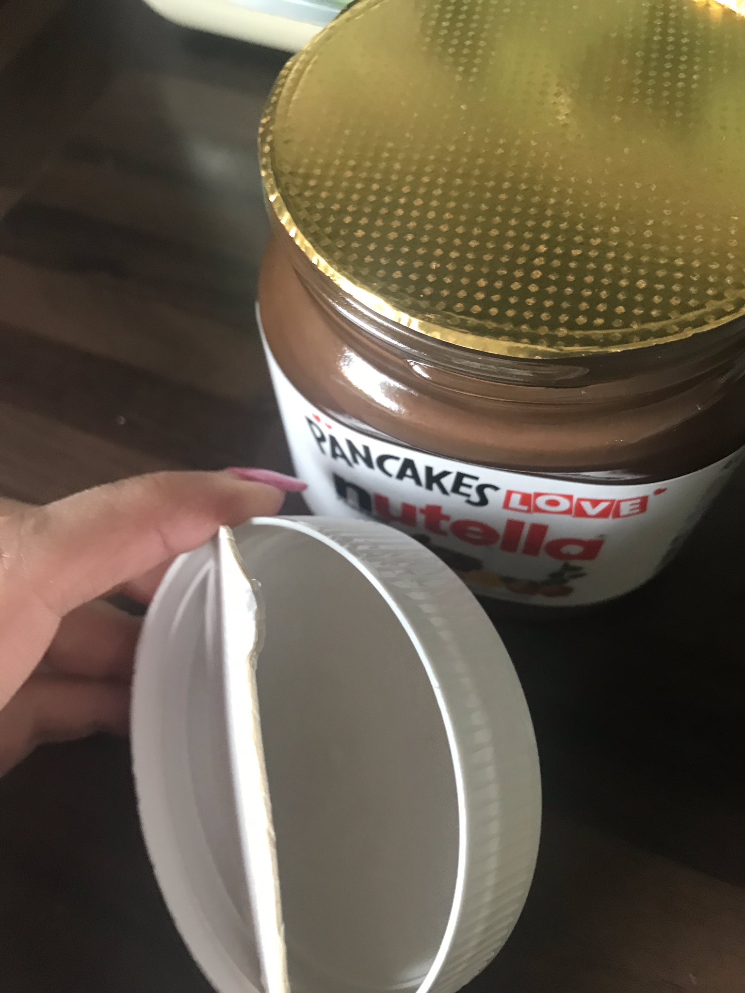 Knife in nutella lid deals
