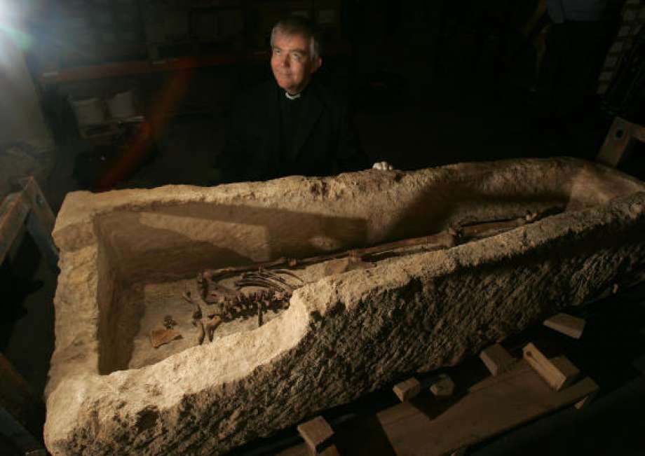 Here's Nick Holtam, the vicar at the time, with the sarcophagus. He's now the Bishop of Salisbury. Nick, not the dead Roman dude. (Photo by Alastair Grant, AP)