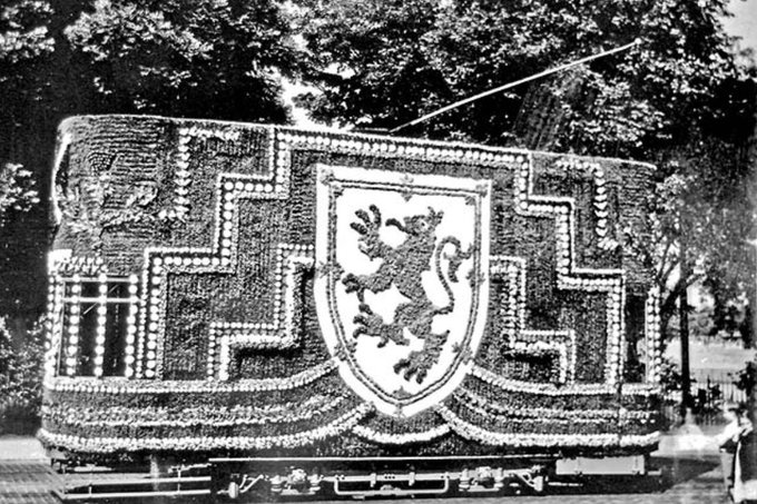 Edinburgh’s old tramway did BRILLIANT decorated trams. This one used 7,500 flowers and lasted for just one day - for the visit to Edinburgh of King George V and Queen Mary in 1934. Source:  http://www.edinphoto.org.uk/0_edin_t/0_edinburgh_transport_trams_decorated_waverley_market_raf.htm#photo_06 (7/11)