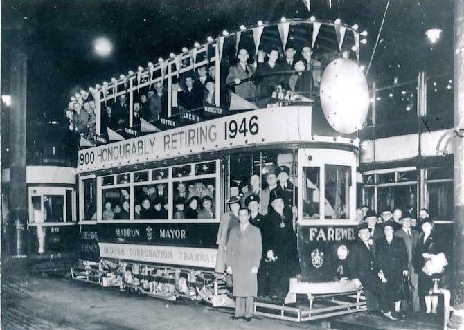 The saddest tram decorations of all were those - often decked in bunting and banners - to commemorate their own demise. This, at Oldham, is typical of the “farewell, old friend” type of tram decoration found in the period. Trams and tram decoration almost died out. (10/11)