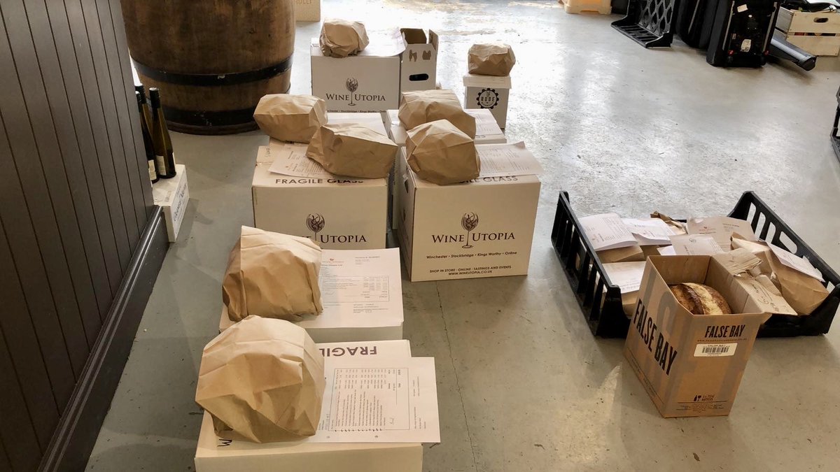 wine_utopia's tweet photo. The sweet smell of fresh @hoxtonbaker 😍. Our team are busy bees picking + packing your orders 🍷🍞 #helloweekend #isolationwine #sourdough #lovewinchester https://t.co/No2OvpPR27