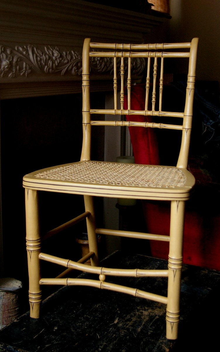 EskdaleR's tweet photo. This Regency faux bamboo chair had a complete restoration. After research, paint sampling and lots of time it was restored. Much better we think although the pink layer looked funky #fauxbamboo #regency #chairrestoration #seatcaning #paintanalysis #paintinvestigation #restoration https://t.co/BUmLYLE0W1