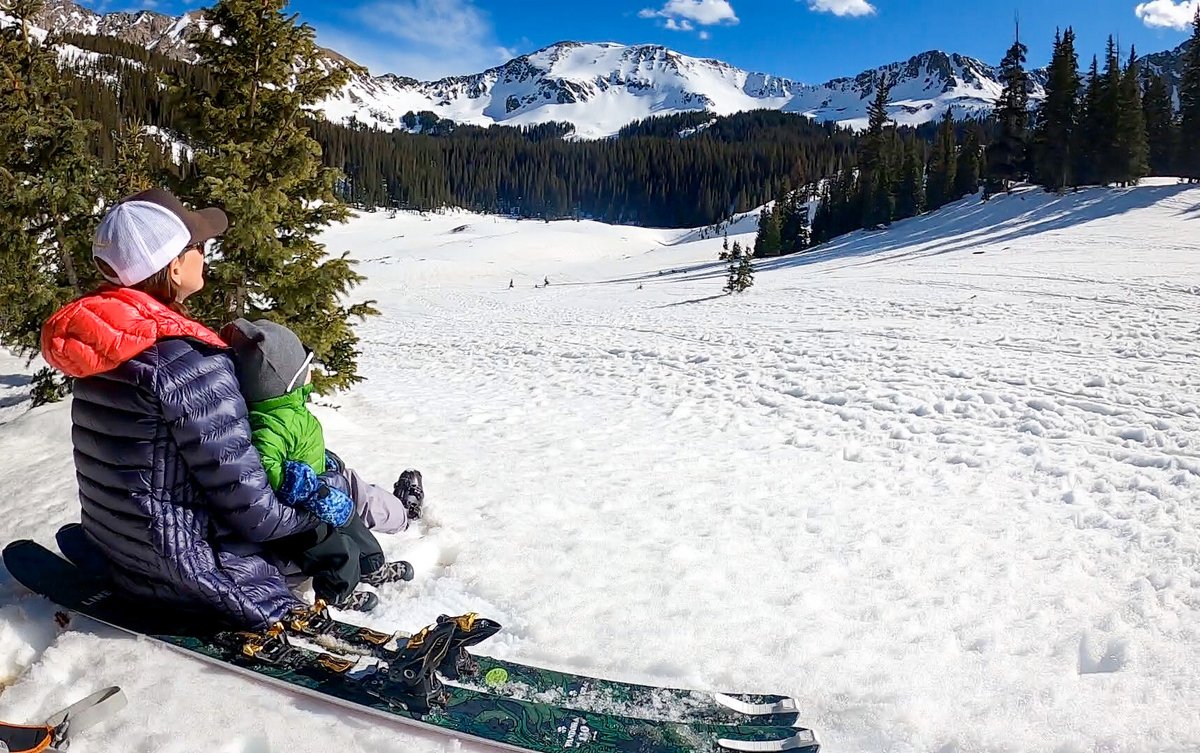 We 💙 this photo from Kristin at Blister review, ski touring with her son in tow. She's wearing the NESSH jacket in grey.