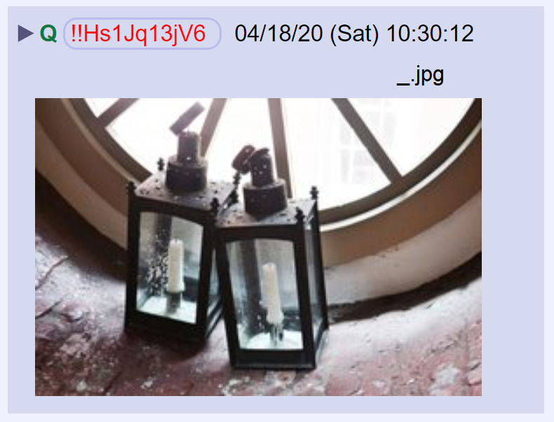 50) This morning's first post from Q. Two lanterns in the window of a tower. Filename: _.jpg