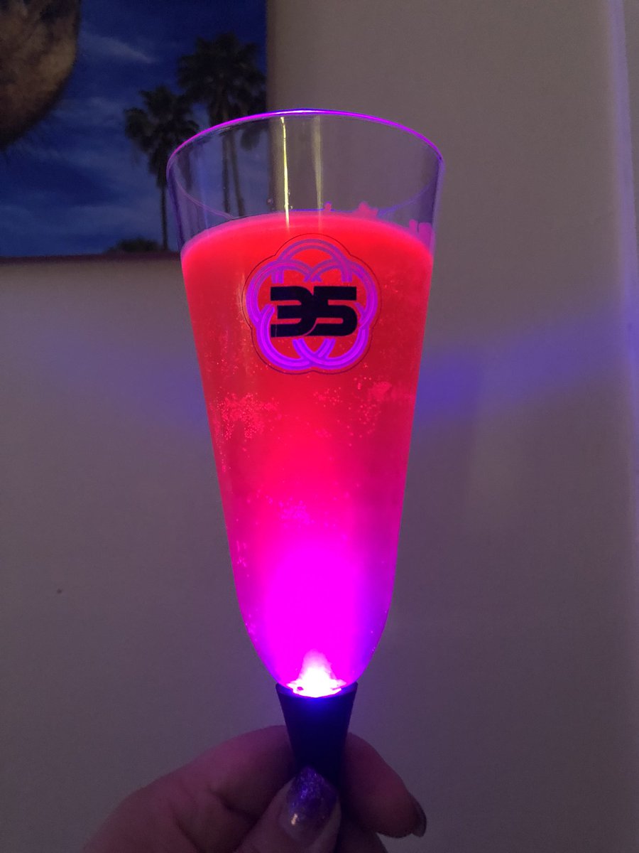 LilDisFan's tweet photo. Cran-mango mimosa in my ‘fancy’ #Epcot35 light up cup. https://t.co/ehl4tGqF4d