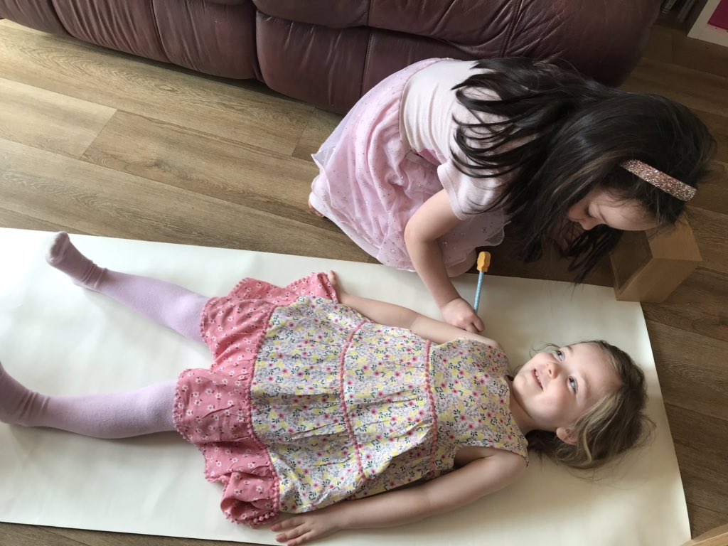 JohnTheOptom's tweet photo. @stwilfshalton Alice learning about what’s inside our body by drawing round her little sister! https://t.co/mrvgvvZGru
