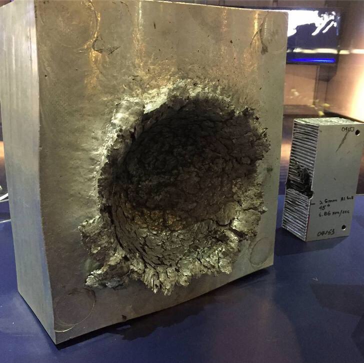 This is what happens to aluminum when hit by a 1/2 oz (~14g) piece of plastic going 15,000 mph (~24000 km/h) in space  #Hypervelocity