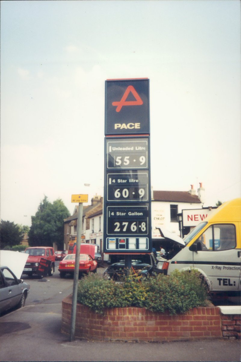 Day 118 of  #petrolstationsPaceWalton Road Garage, East Molesey, Surrey 1994  https://www.flickr.com/photos/danlockton/15644289143/  https://www.flickr.com/photos/danlockton/16238267256/I love the umbrella—hesitate to categorise it as  #jugaad, but close. Also the Maserati before Surrey was full of them. In 1994, an idiosyncratic choice