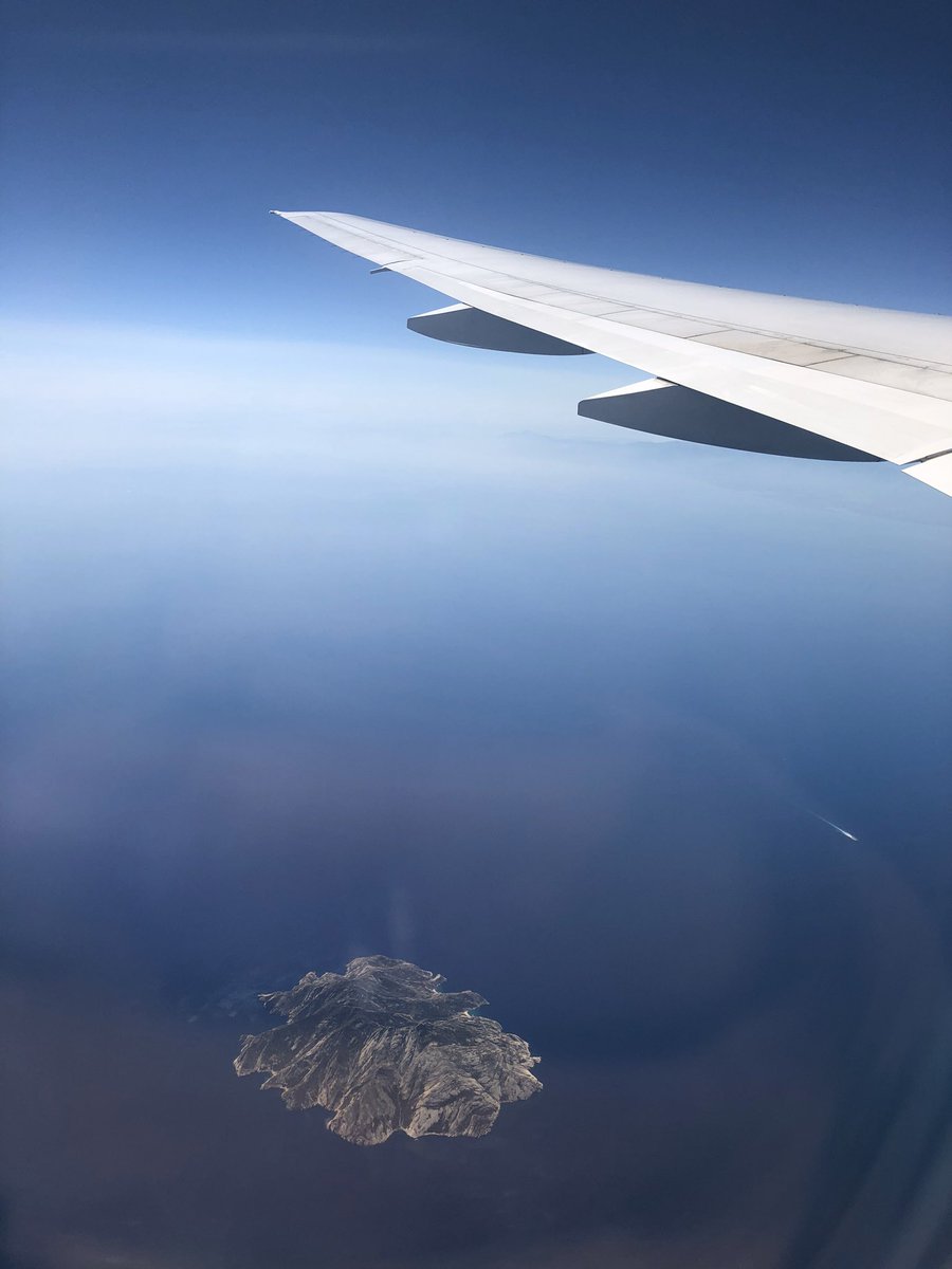 SamGabrielliwx's tweet photo. Remember the days when folks frequently traveled? This is one of my favorite 📷 of the island Montecristo in the Mediterranean Sea! #PicsFromAPlane https://t.co/id9dqokQsA