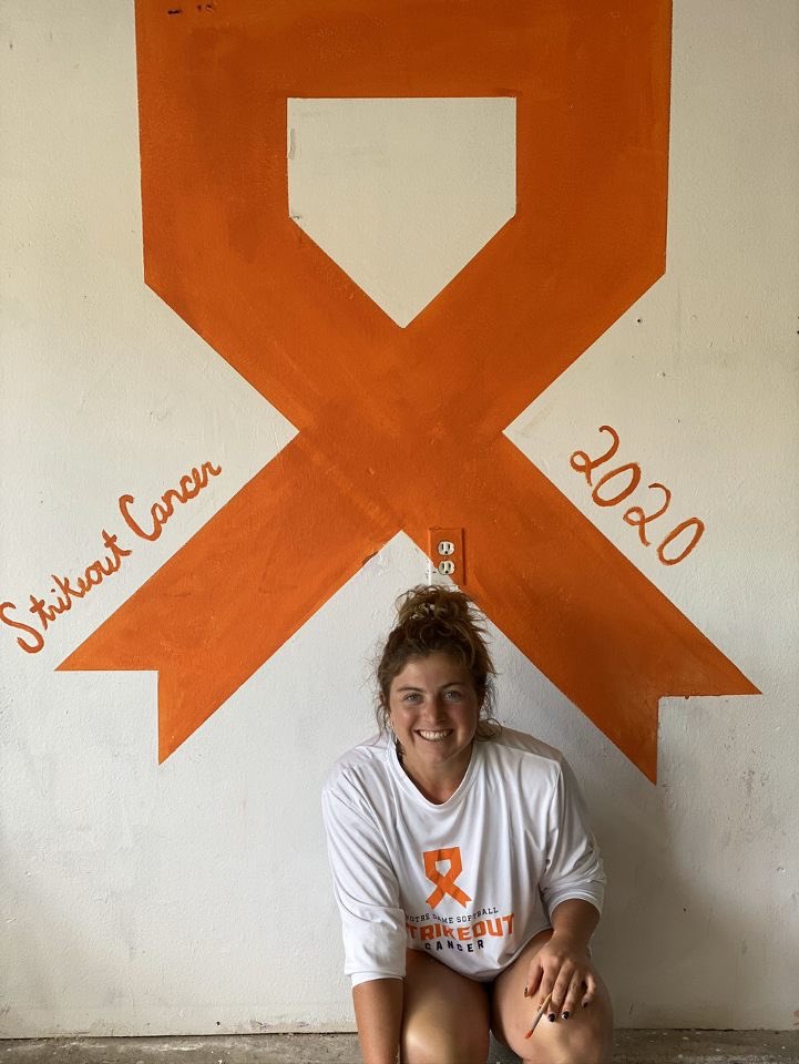 NDsoftball's tweet photo. Getting creative with our orange! Emma Clark @emmaa_clarkk with a MASTERPIECE! #NDStrikeOutCancer #GoIrish https://t.co/05DEBOwJSo
