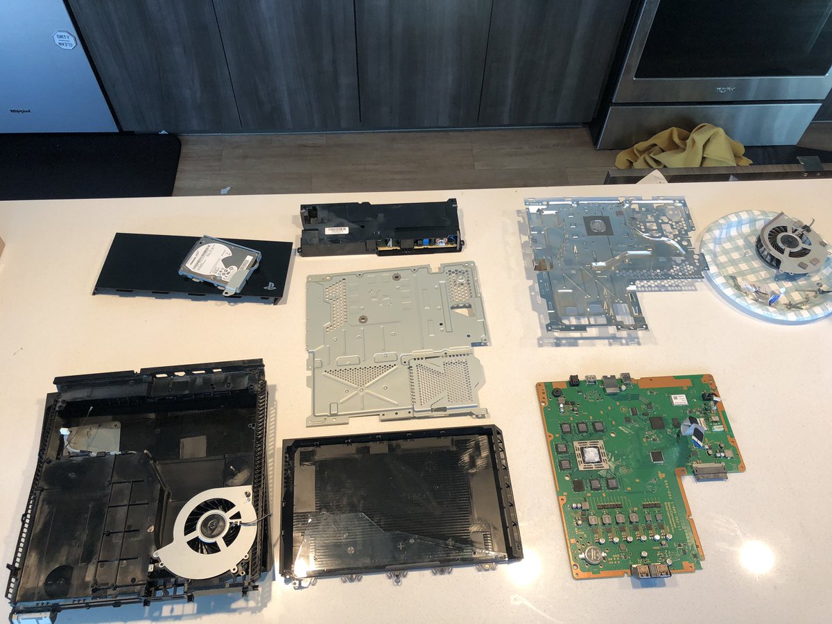 techtimefly's tweet image. full disassembly layout. let’s hope it powers back on. #systemrepair #playstation #gaming #diy