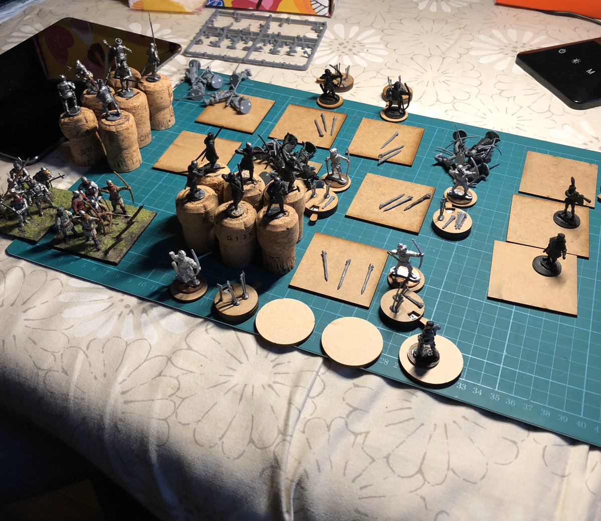 This bunch of random model parts heaped around mdf bases should ultimately become an English Army.